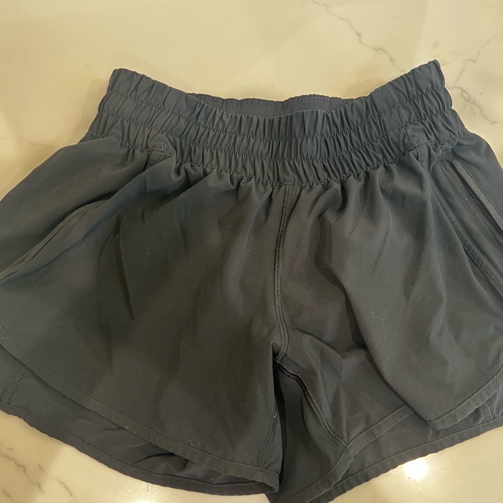 Lululemon Track That, high rise short, 4 inch inseam.  Size 8